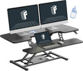 FLEXISPOT Standing Desk Converter 42-inch Spacious Sit to Stand up Dual Monitor and Laptop Riser, Big Size Tabletop Workstation with Large Keyboard Tray, Black